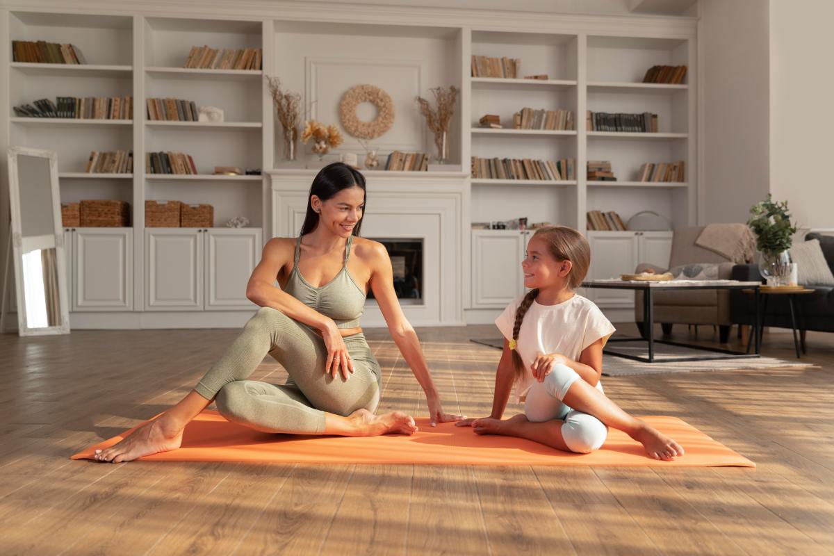 Mom finds some time to do yoga from her busy schedule with her kids