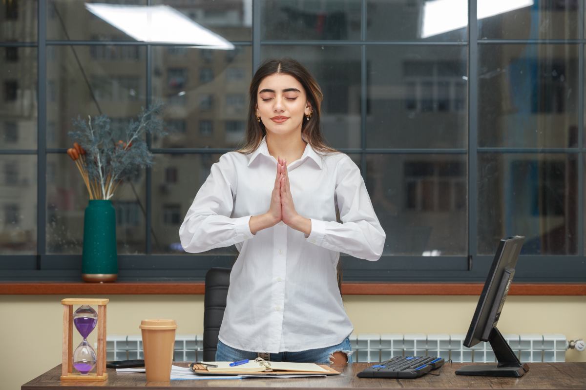 Women doing yoga in between her busy schedual